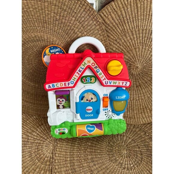 Fisher-Price Laugh & Learn Puppy's Busy Activity Home - Picture 1 of 11
